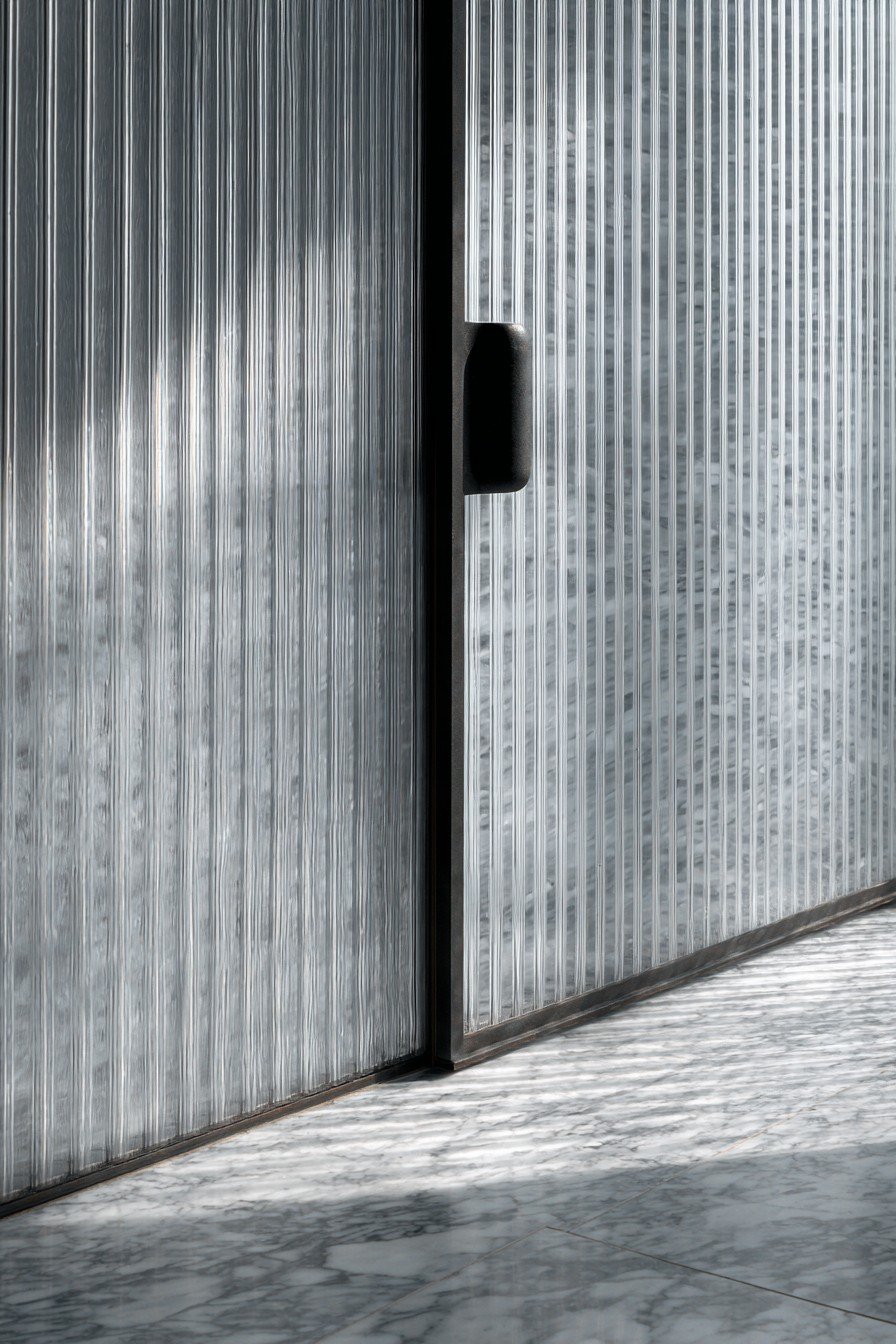 Space-Saving Ribbed Glass Pocket Door