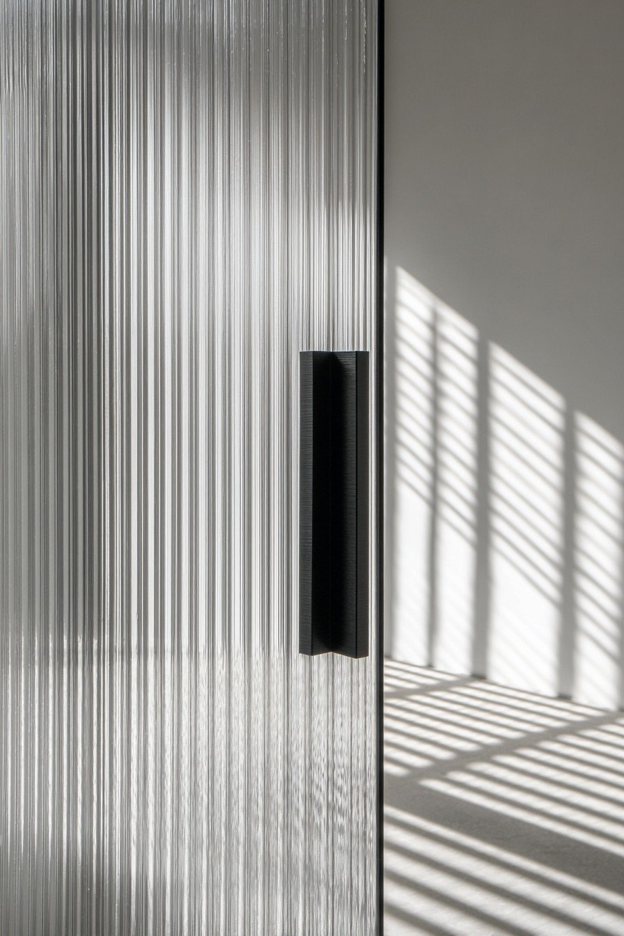 Space-Saving Ribbed Glass Pocket Door