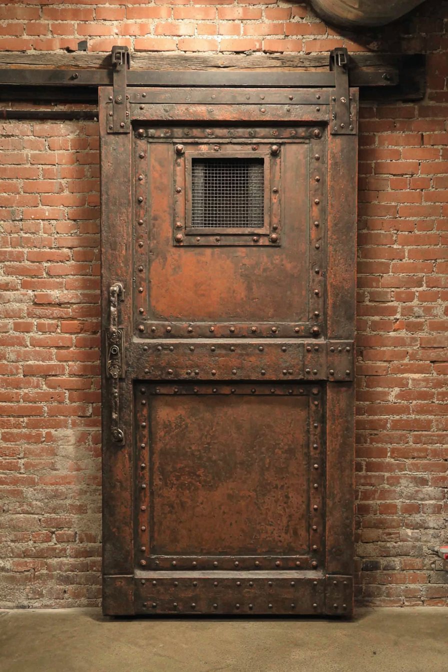 Industrial Steel Door with Riveted Panels