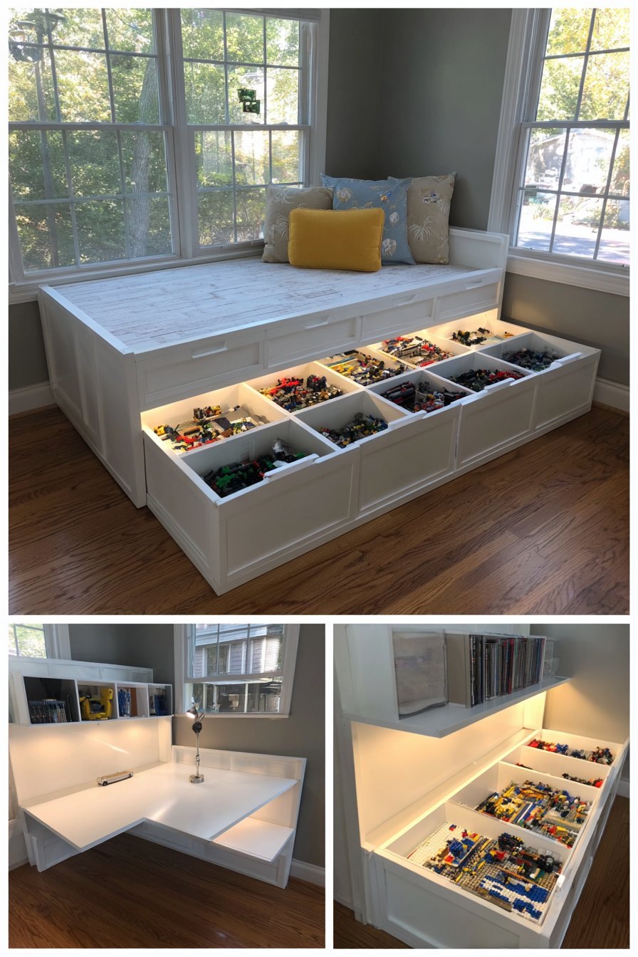 Oak storage platform bed with six divided drawers, open headboard shelving and a swing-arm building table