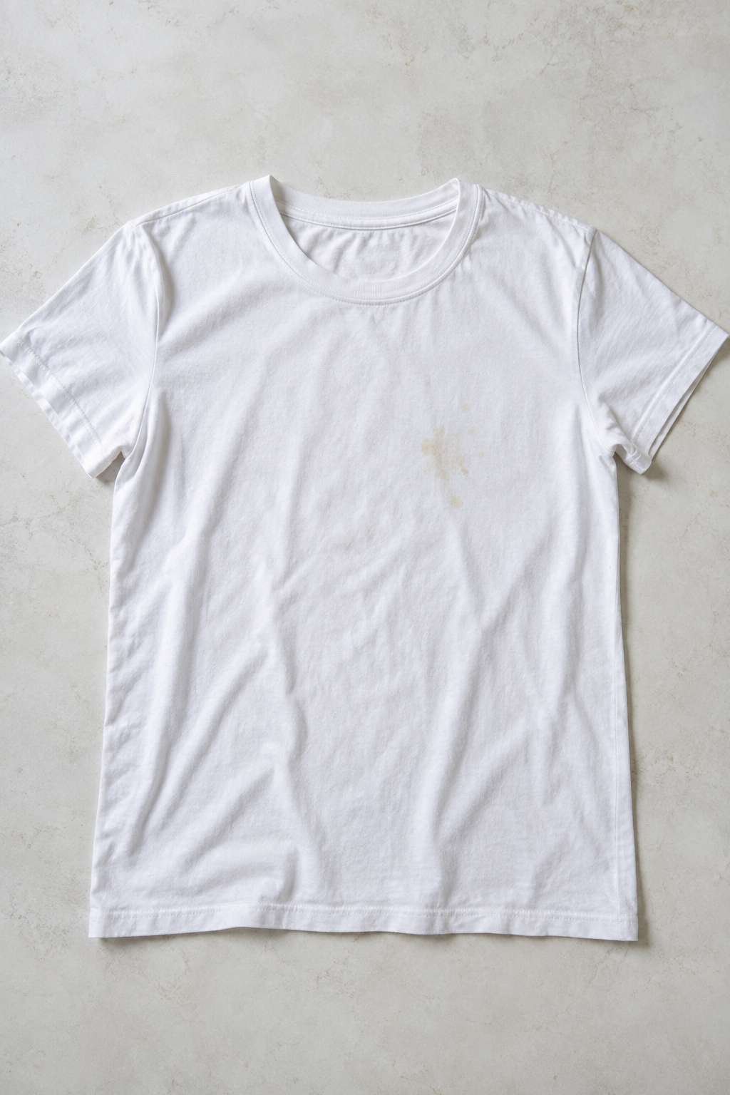 Faint stain remaining on fabric from underdosed detergent